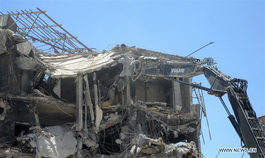 SYRIA-DAMASCUS-HARASTA-RUBBLE-REMOVAL