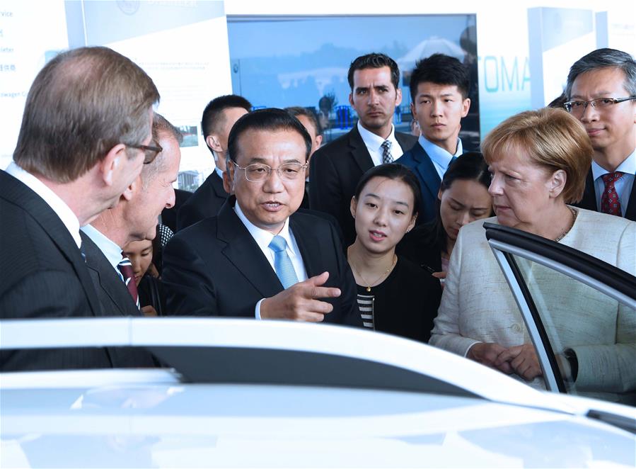 GERMANY-BERLIN-CHINA-LI KEQIANG-MERKEL-AUTOPILOT COOPERATION EXHIBITION