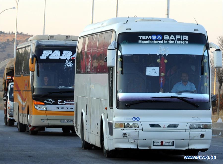 SYRIA-DAMASCUS-LEBANON-REFUGEES-RETURNING