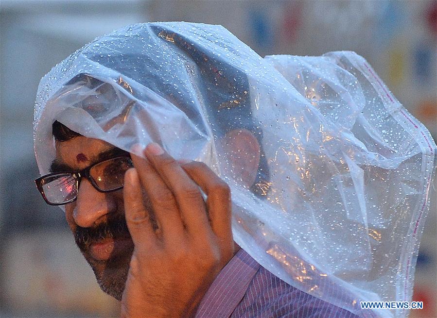 INDIA-BANGALORE-WEATHER-RAIN