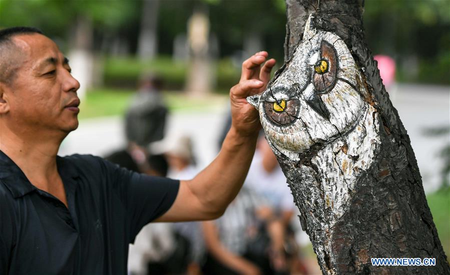 CHINA-JILIN-CHANGCHUN-TREE BARK CARVING AND PAINTING (CN)