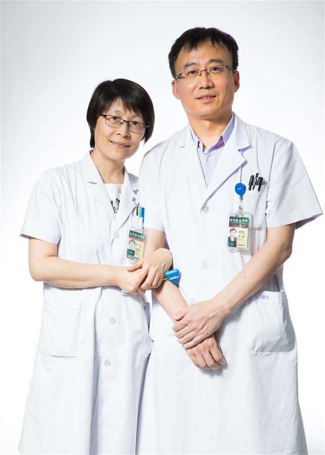 (FOCUS)CHINA-BEIJING-MEDICAL WORKERS' DAY-PHYSICIAN COUPLE (CN)