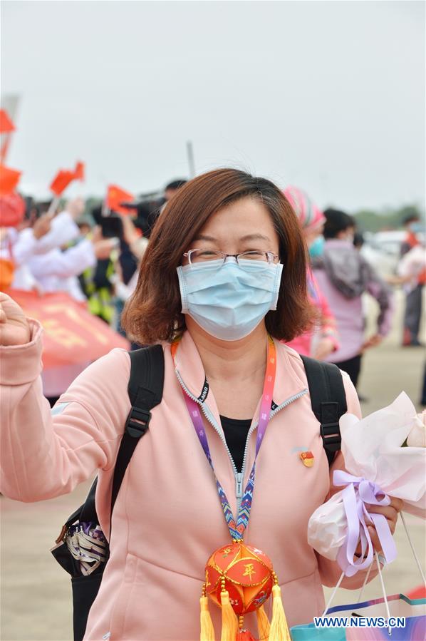 CHINA-GUANGXI-COVID-19-MEDICS-RETURN HOME-ARRIVAL (CN)