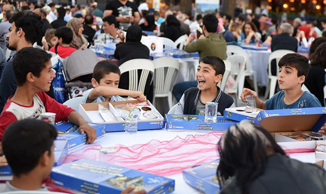 First fast-breaking meal of this year's Ramadan served at Taksim Square in Turkey