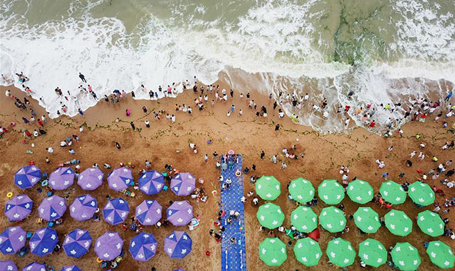 People across China cool themselves down in various ways during Xiaoshu